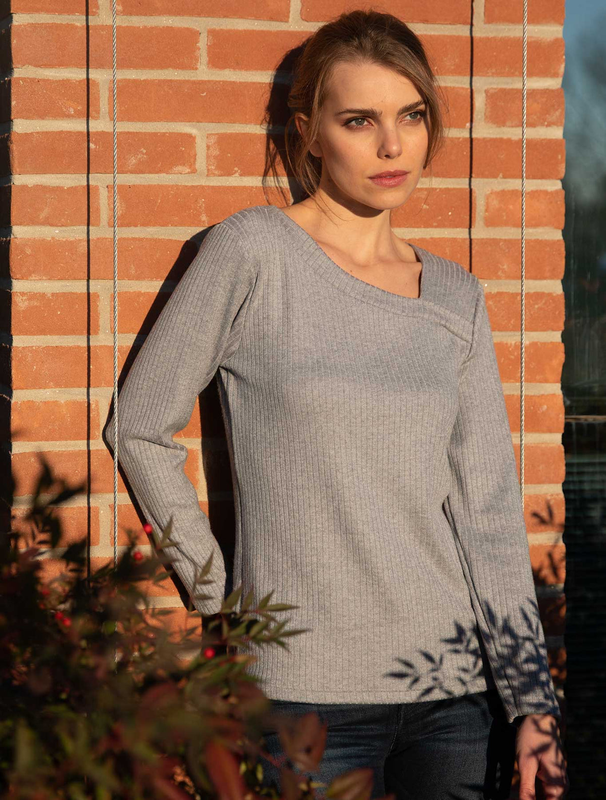 Ribbed knit sweater with diagonal neckline