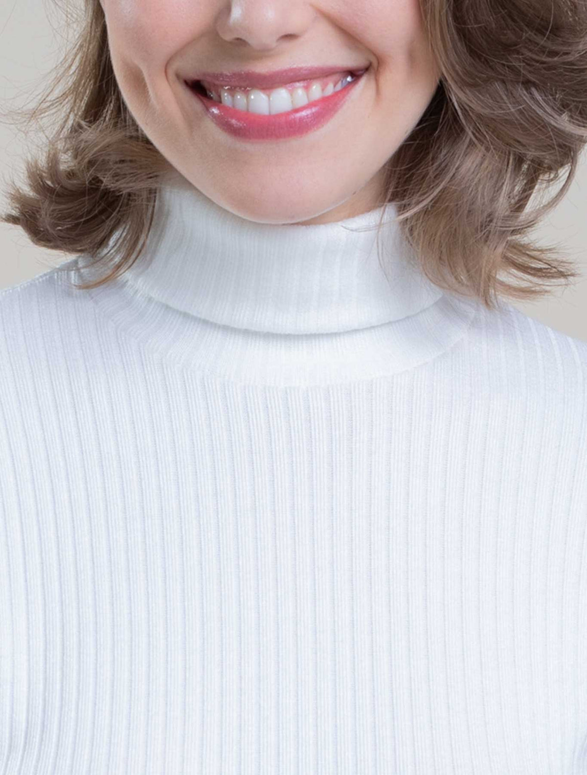 Col roulé sans manches tricot